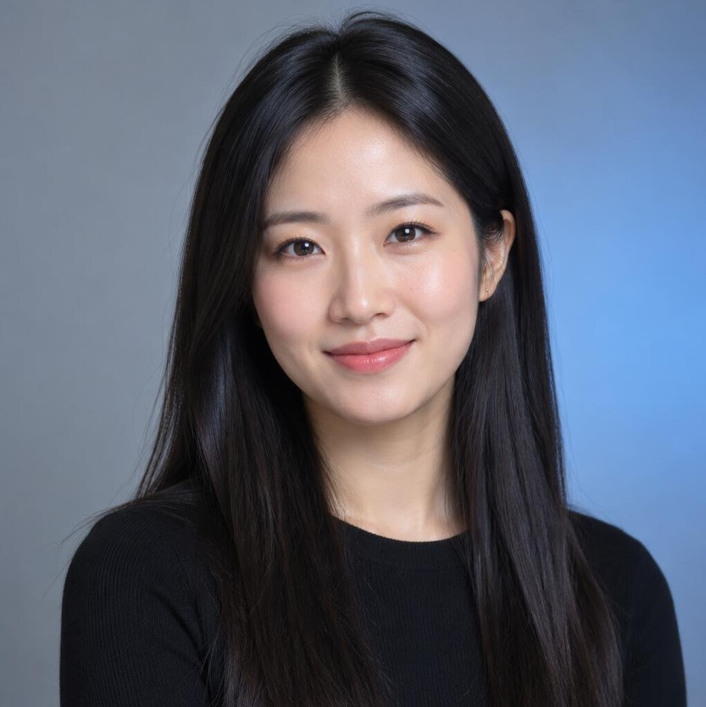 Portrait of a young woman with dark hair and a soft smile